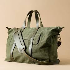 For those who appreciate a rugged and utilitarian aesthetic, a military tote bag is the perfect choice