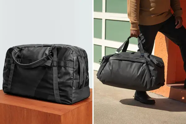 A man holds a duffle bag