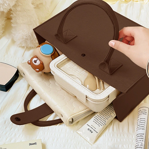 Spacious and stylish, these felt tote bags are perfect for work or casual outings.