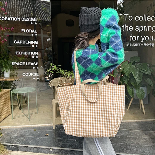 Versatile reversible tote bag offering two stylish looks in one.