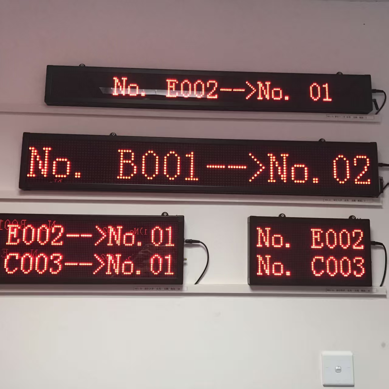 Technician performing LED display maintenance showing SMD module replacement and industrial LED screen servicing process