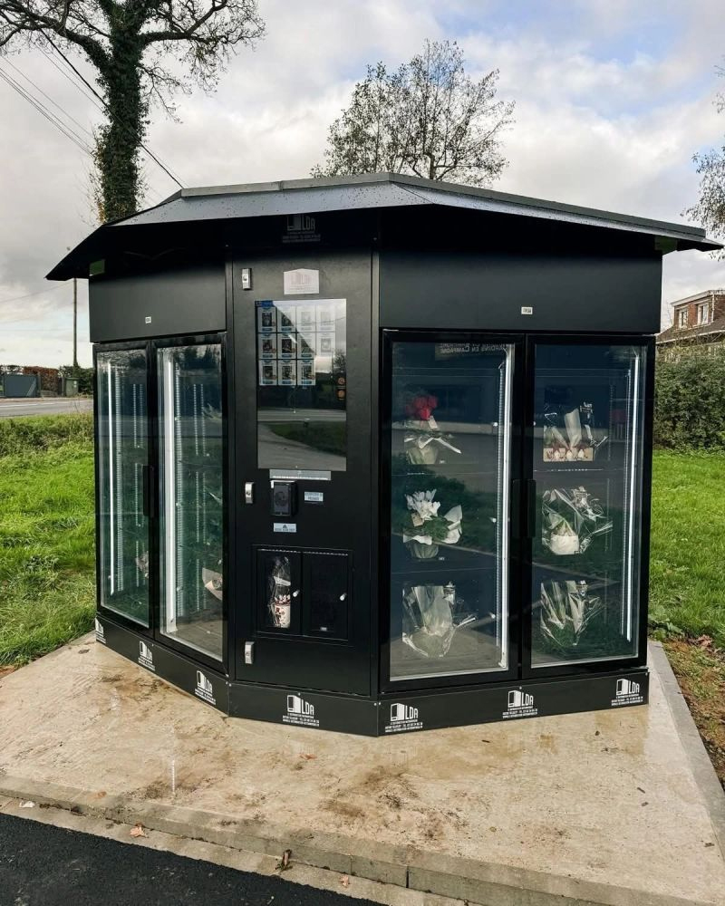 A French customer placed a flower vending machine outdoor to boost income.