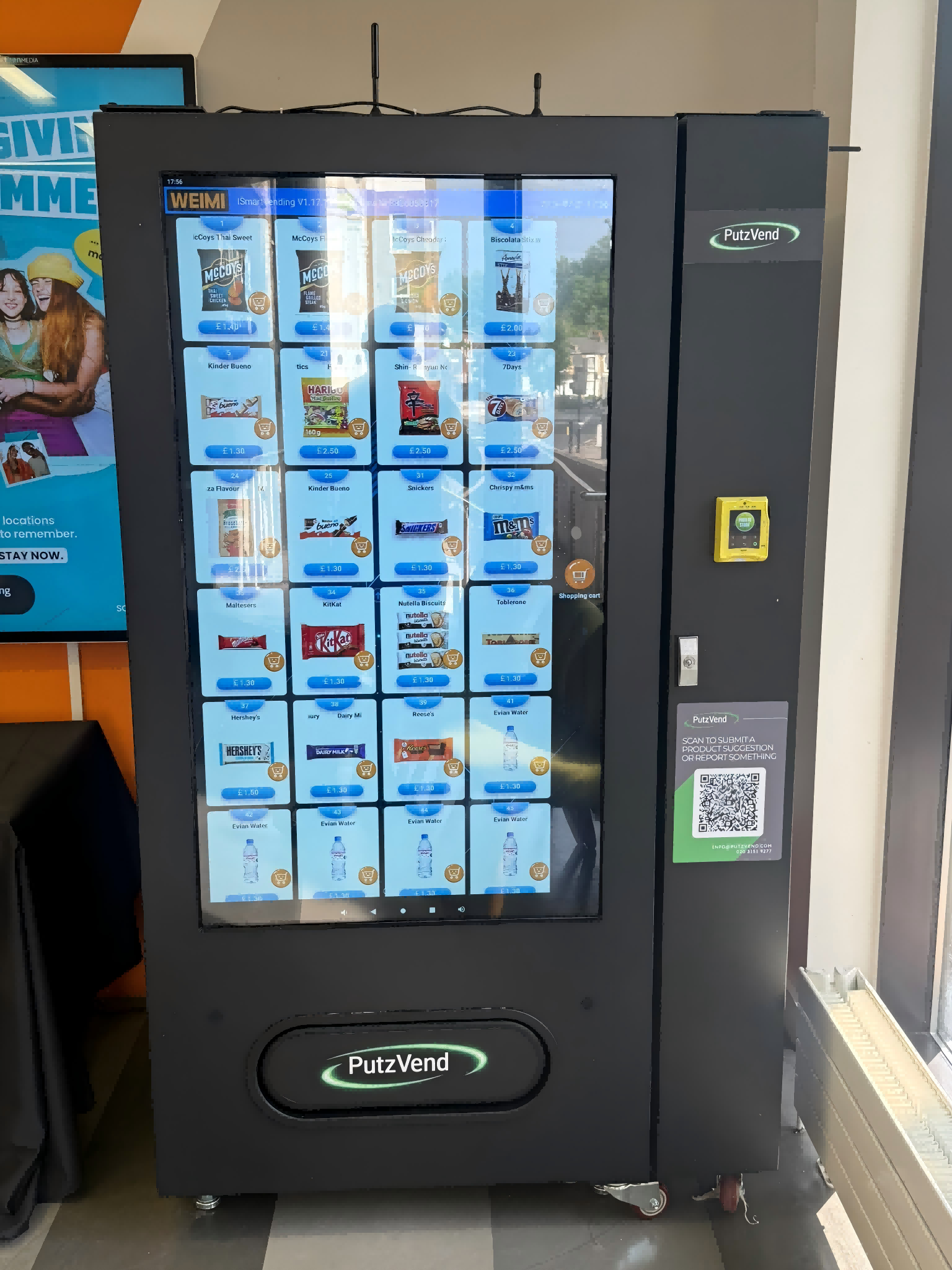 55-inch big screen snack vending machine selling snacks and drinks in a UK shopping mall