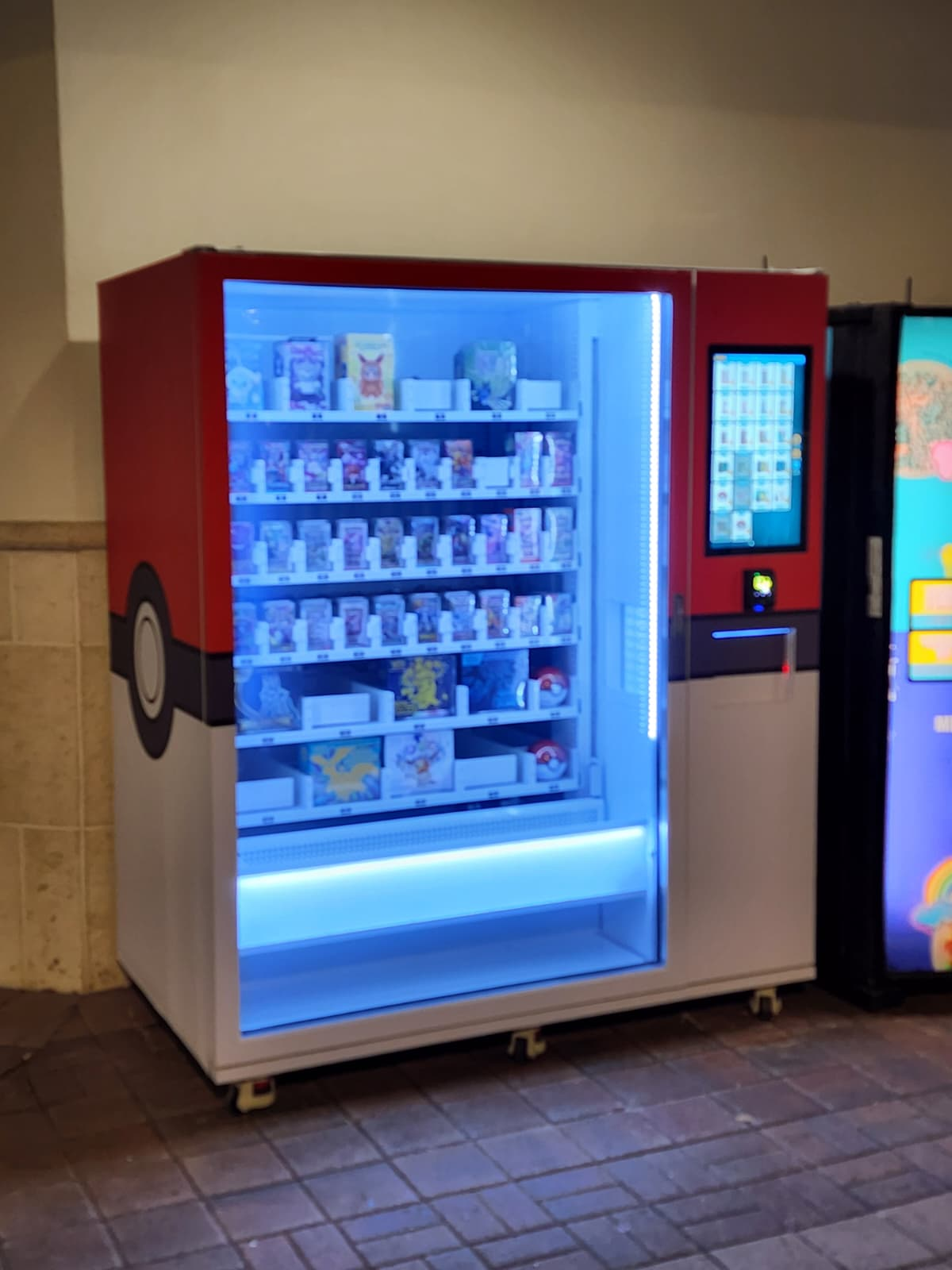 A customer use our large capacity vending machine to sell Pokemon products.
