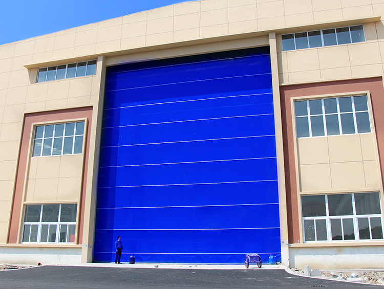 fabric upper folding hangar door