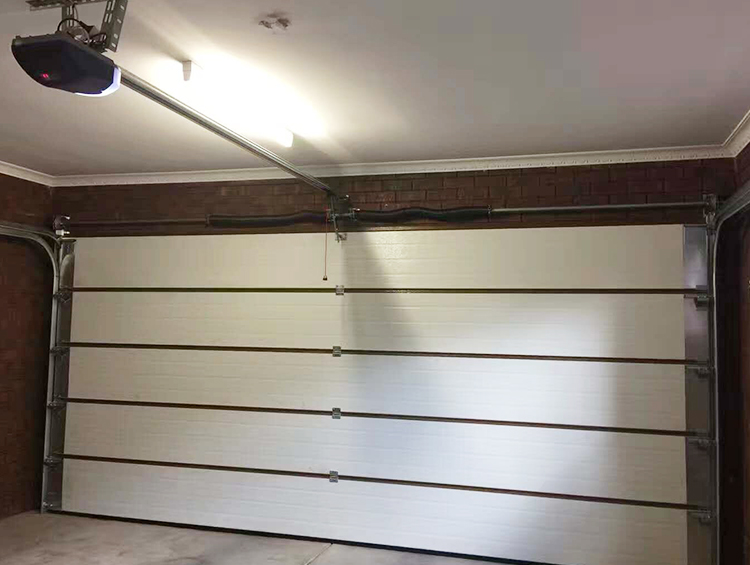 causes of garage door spring breakage