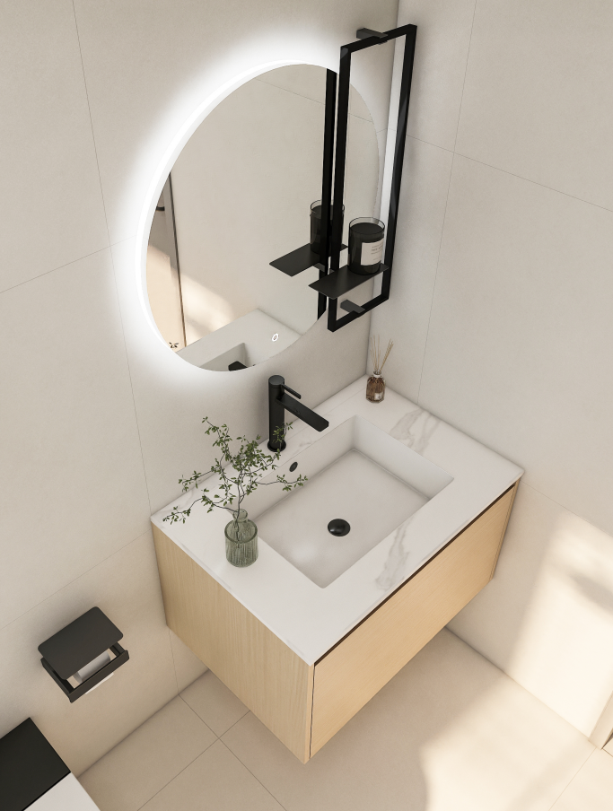 A bathroom cabinet with sink that combines the cabinet, countertop, and basin into one unit eliminates gaps and saves space. Materials like sintered stone or quartz create a seamless surface that’s easy to clean, while undermount sinks free up counter space for daily essentials.