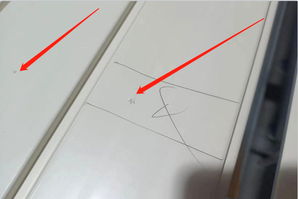 Professional QC inspects the surface of shutter components