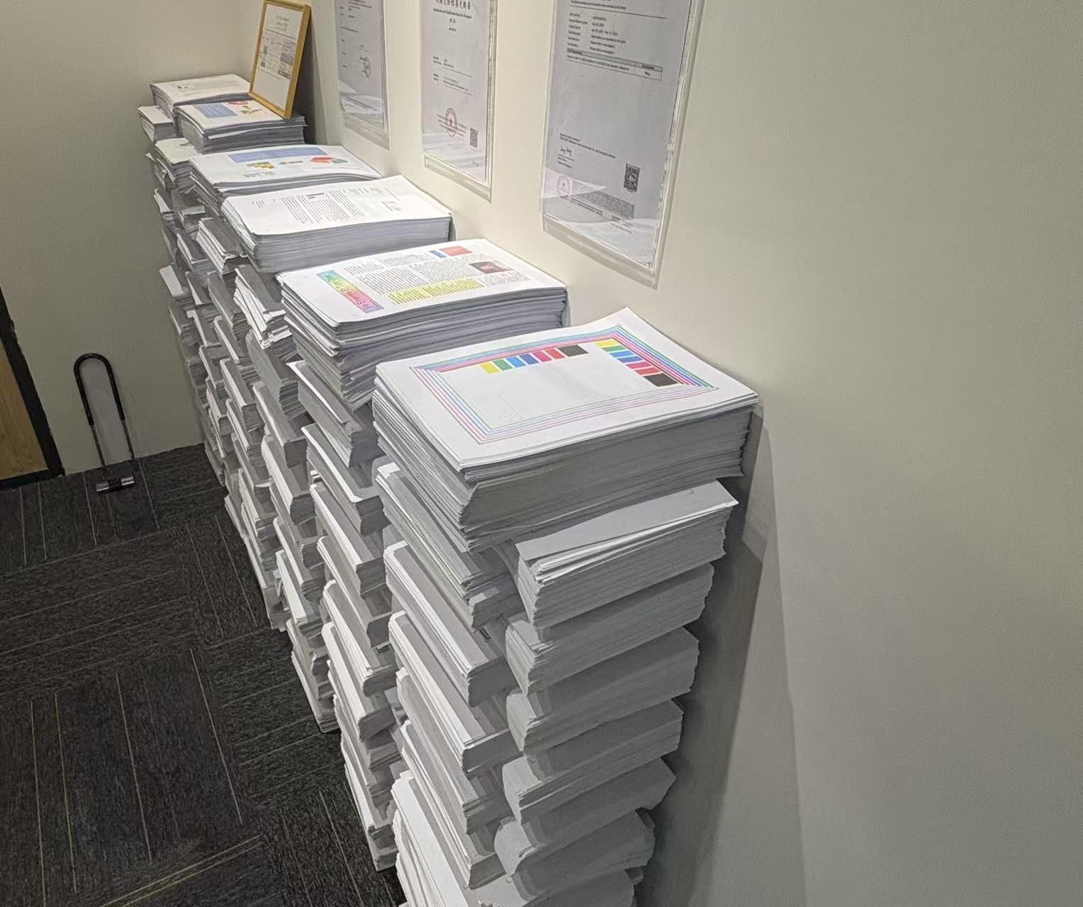 Stacks of printed documents using Chameleon ink - high page yield printer ink for bulk printing