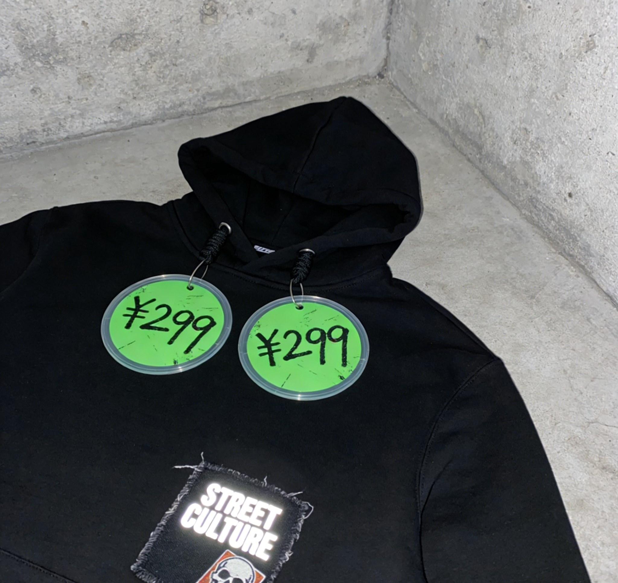 clothing price tags and personalised swing tags attached to garments.