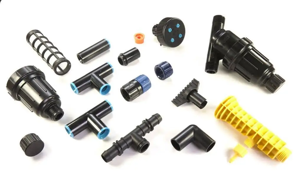 **Overmolding** bonds new materials to existing parts via secondary injection for dual-color or integrated functions. **Insert molding** pre-inserts components (metal/plastic) into molds to create composite structures, enhancing strength and versatility.