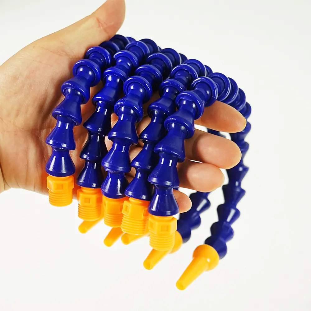 Flexible plastic cooling hose directs coolant precisely for efficient heat management in machining.