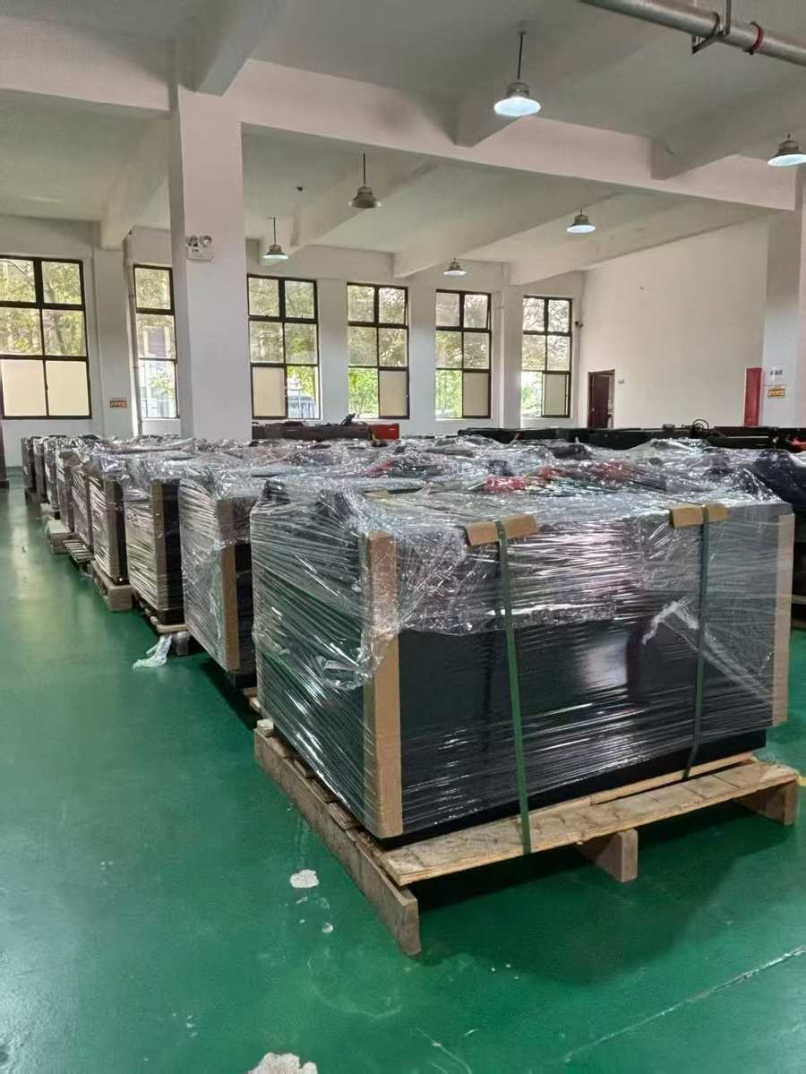 Lithium forklift battery packs bolted to pallets, stretch-wrapped and strapped