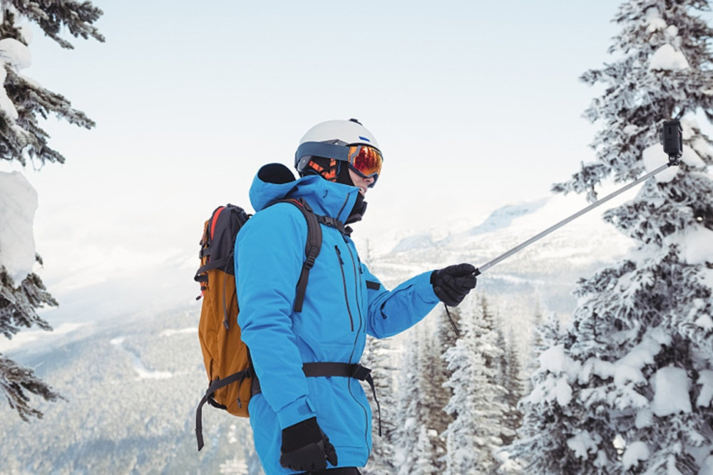 A Person is Taking a Photo with a Selfie Stick