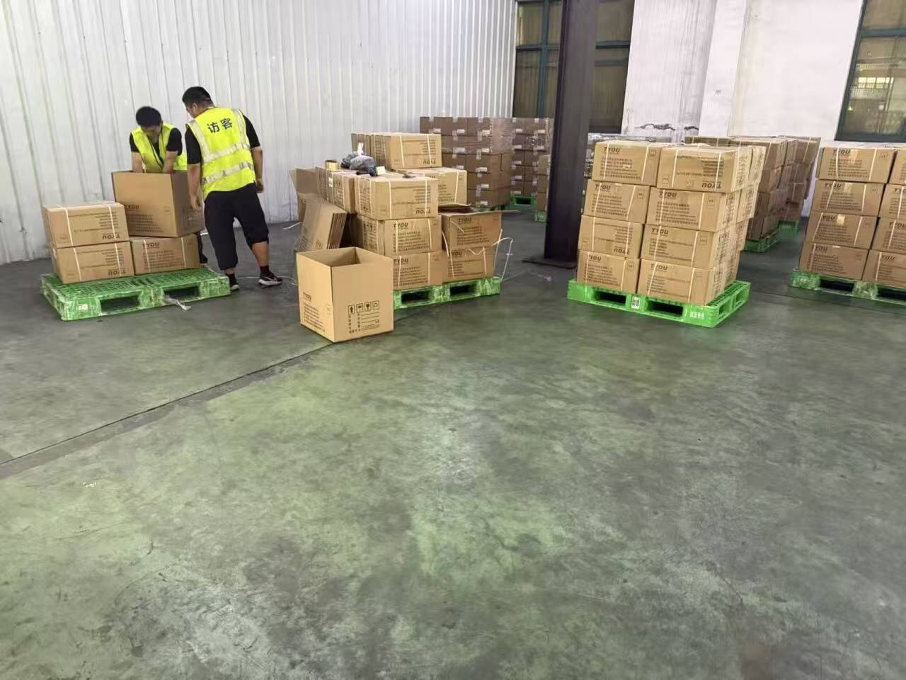 Team replacing damaged cartons at Shanghai customs warehouse for PV products