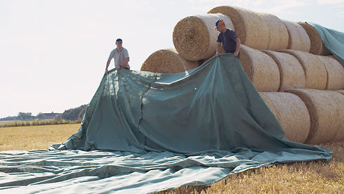 PVC tarpaulin provides a comprehensive protection system for hay storage