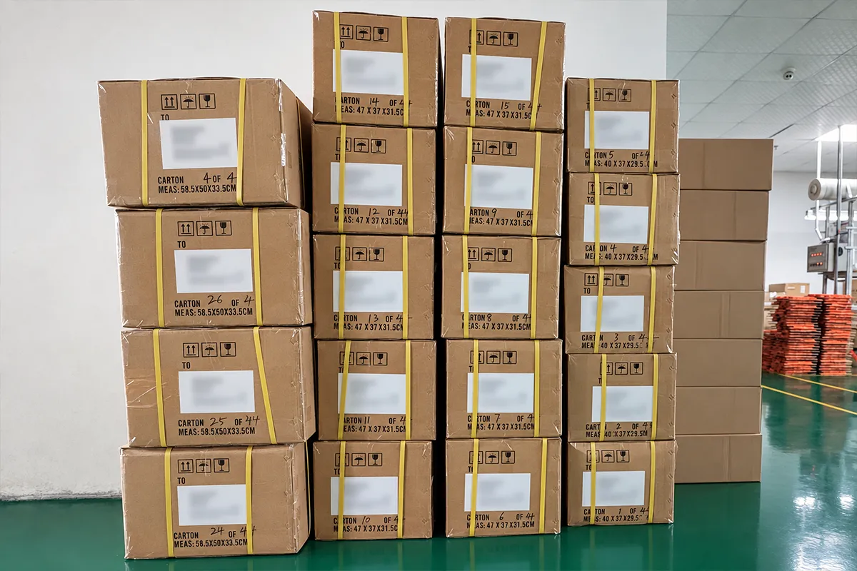 Packed WEX pager shipment cartons awaiting dispatch at the Shenzhen factory