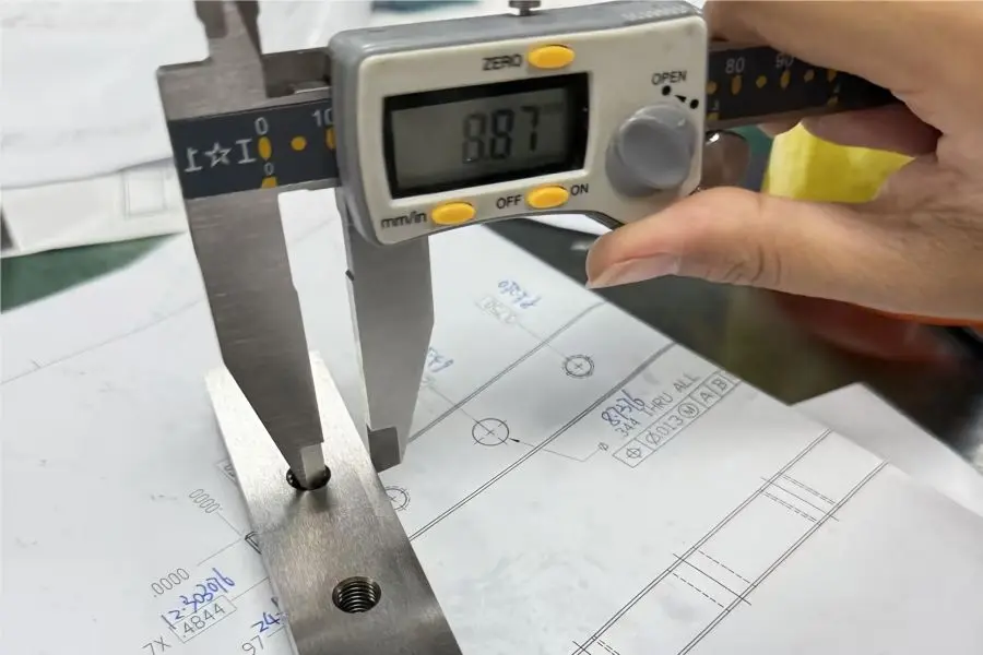 Feature Size and Positional Deviation Check Inspection of feature size and positional deviation on a precision CNC machined part