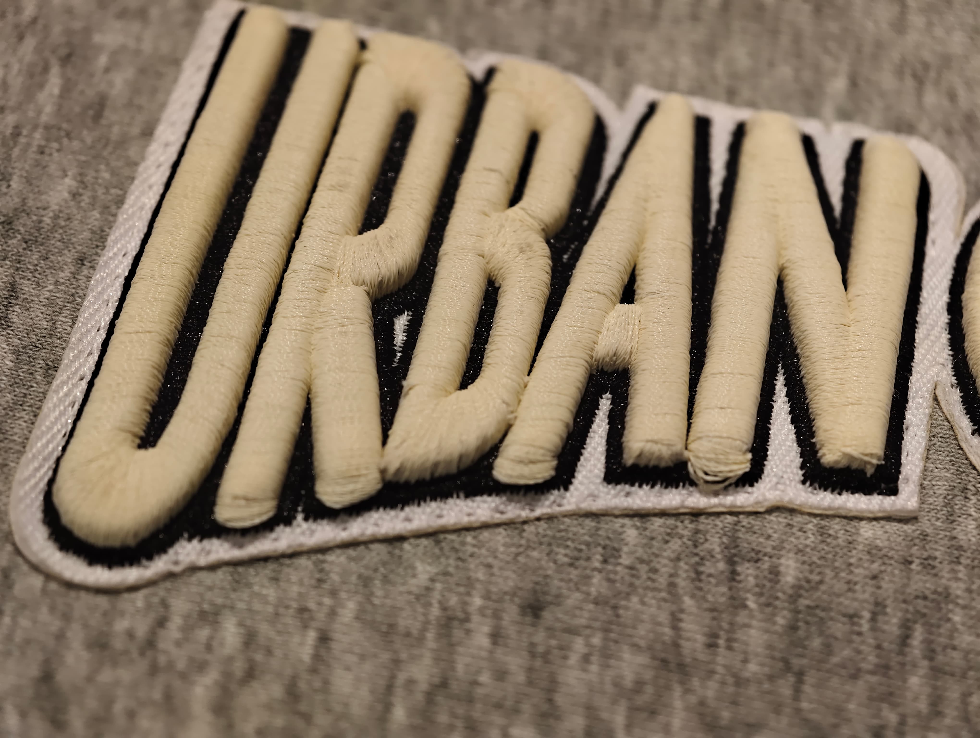 Raised 3D foam embroidery on custom apparel