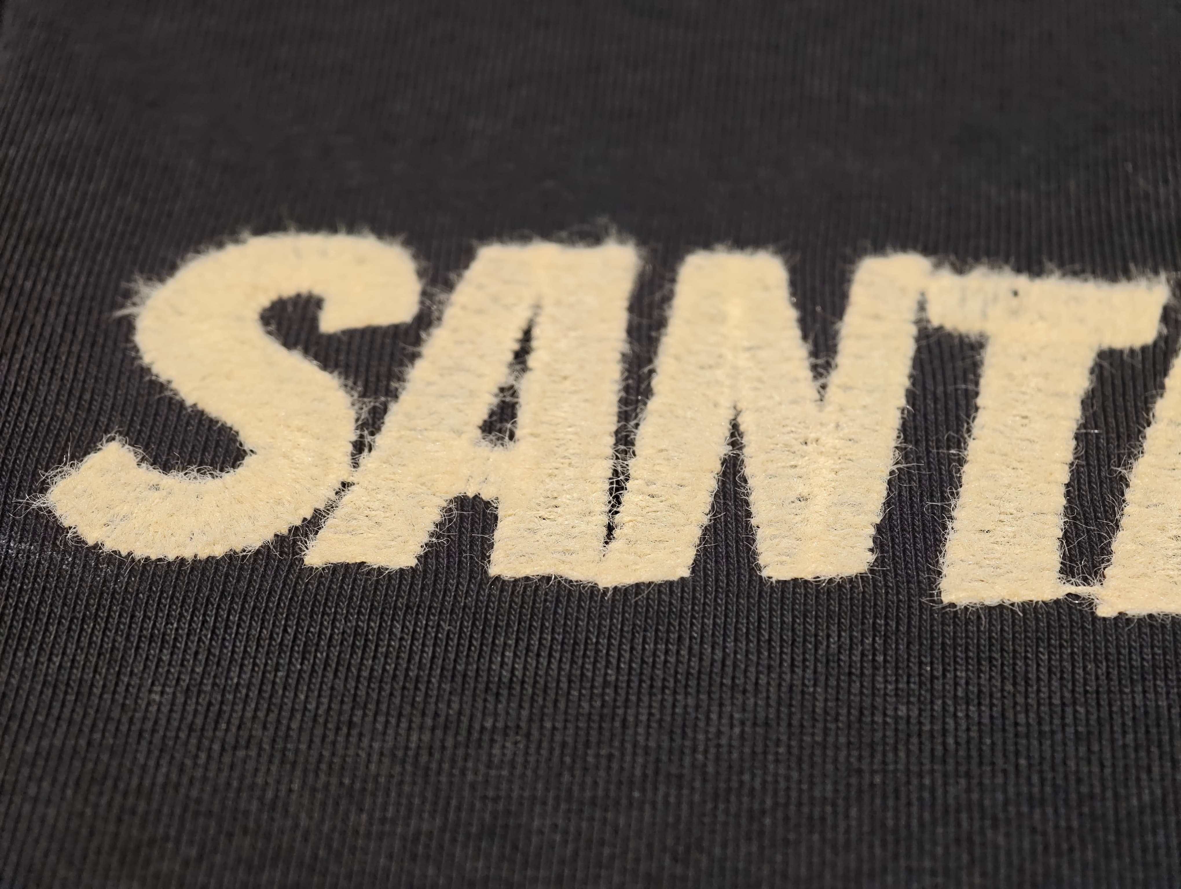 Chenille embroidery with soft looped yarn texture