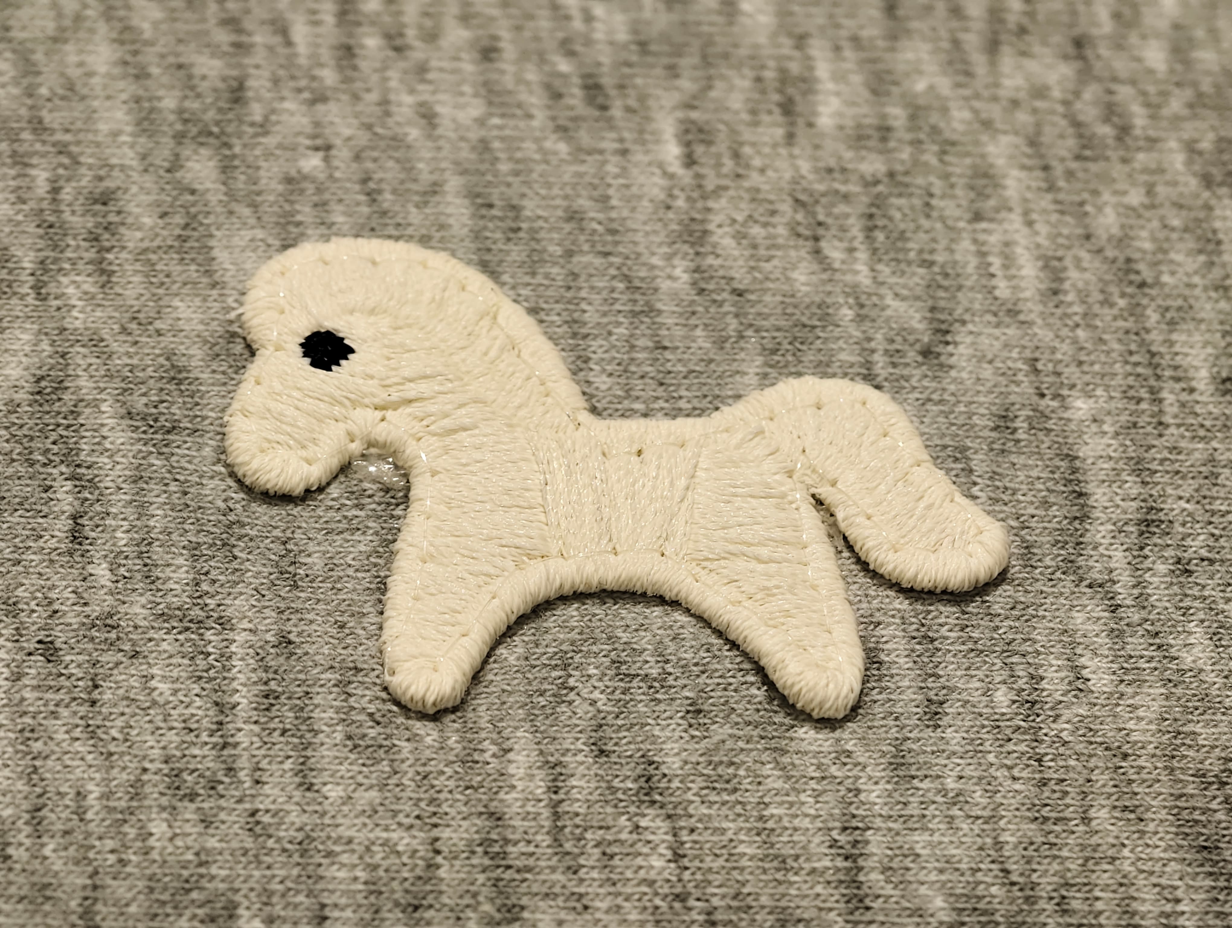 3D thick thread embroidery with raised textured surface