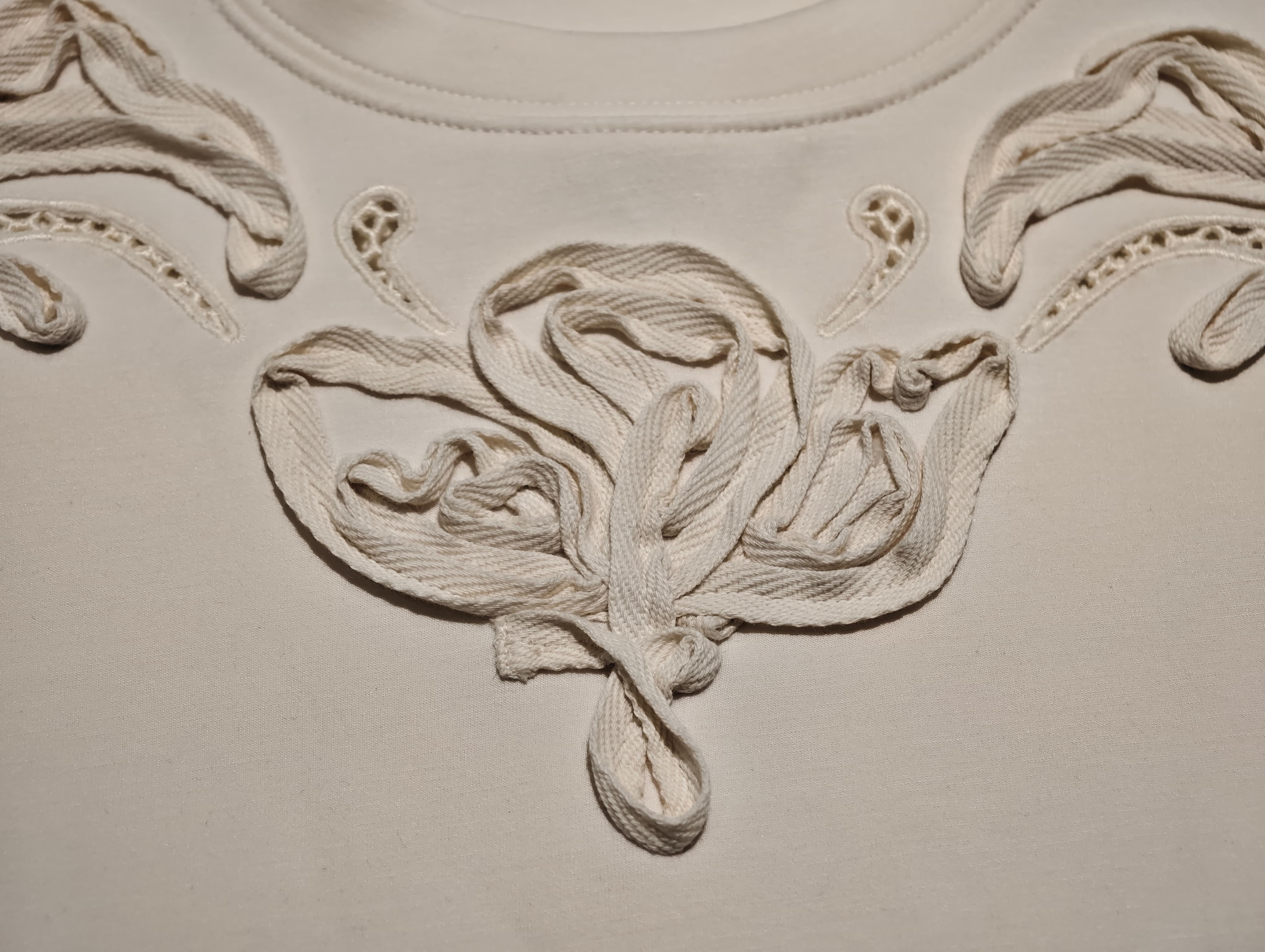 Ribbon embroidery combined with eyelet cutwork details