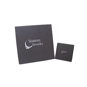 Small white jewelry box with foam