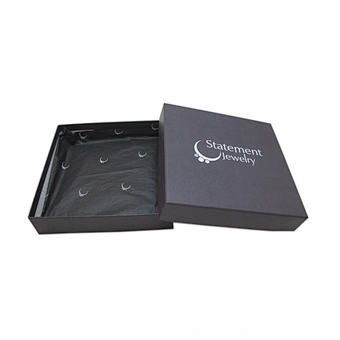 Small white jewelry box with foam