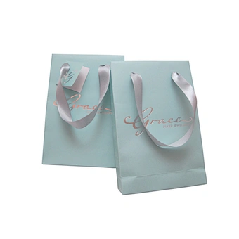 Accept custom printed blue paper bag with ribbon