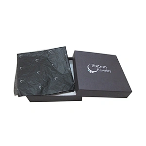 Small white jewelry box with foam