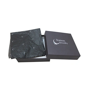 Small white jewelry box with foam