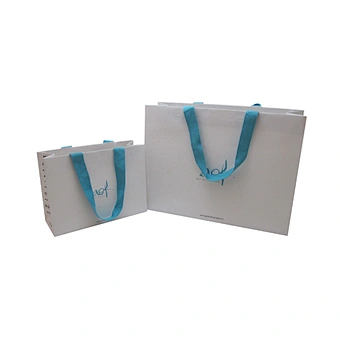 Luxury jewelery paper bags with blue ribbon rope