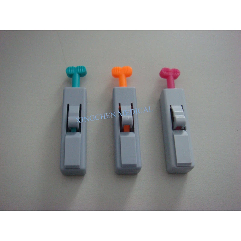 XC1118  Button Type Safety Blood Lancet