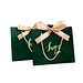 large paper bag with ribbon