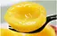 820g de fruits de pêche jaunes en conserve