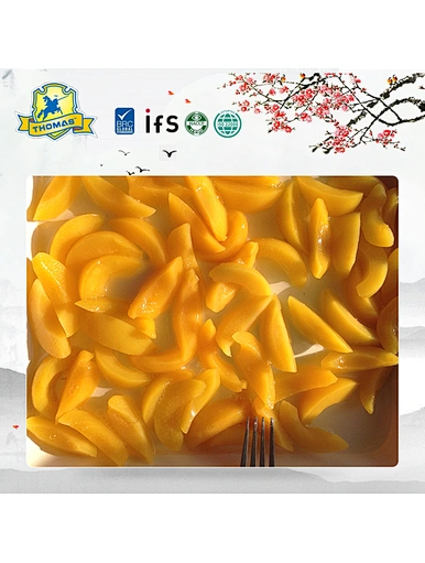 Enfants snack fruits en conserve moitiés de pêche jaune