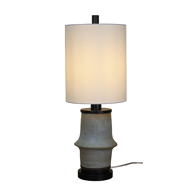 Gray ceramic with white linen shade table lamp