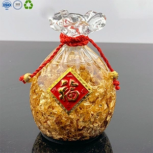 Glass apple with gold leaf