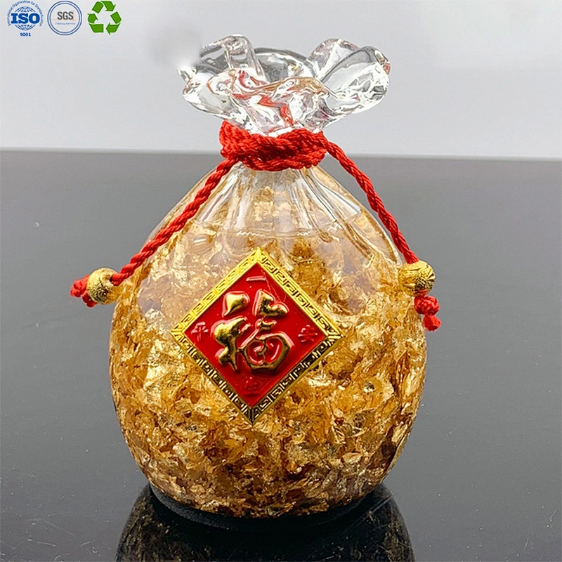 Glass apple with gold leaf