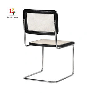 Bow rattan dining chair