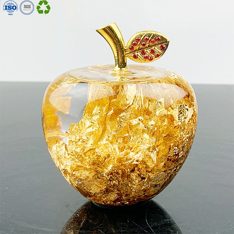 Glass apple with gold leaf