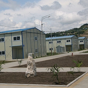 Casa prefabricada tipo T anti-temblor de prueba de agua de suministro de fábrica de China de construcción rápida para la oficina del dormitorio del campo de trabajo del personal temporal