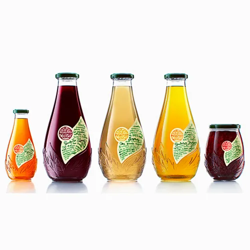 Proveedor de fabricante profesional jugo de botella de bebida de vidrio transparente para bebidas
