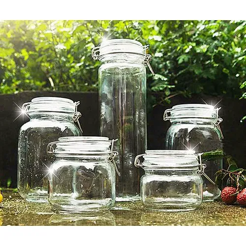 Tarro de cristal durable colorido de la especia del nuevo diseño con la venta al por mayor de la tapa