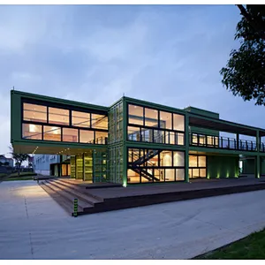 Campamento prefabricado ignífugo de la casa del envase del paquete plano del panel sándwich de los 40 pies de la alta calidad de GZXINCHENG