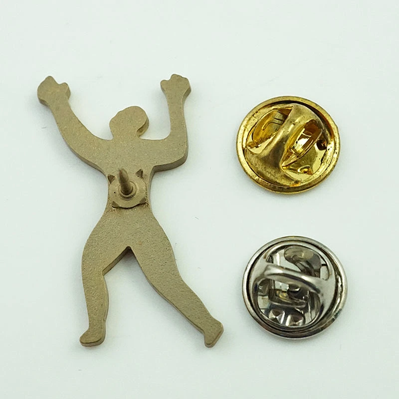 Metal man shaped pin badge