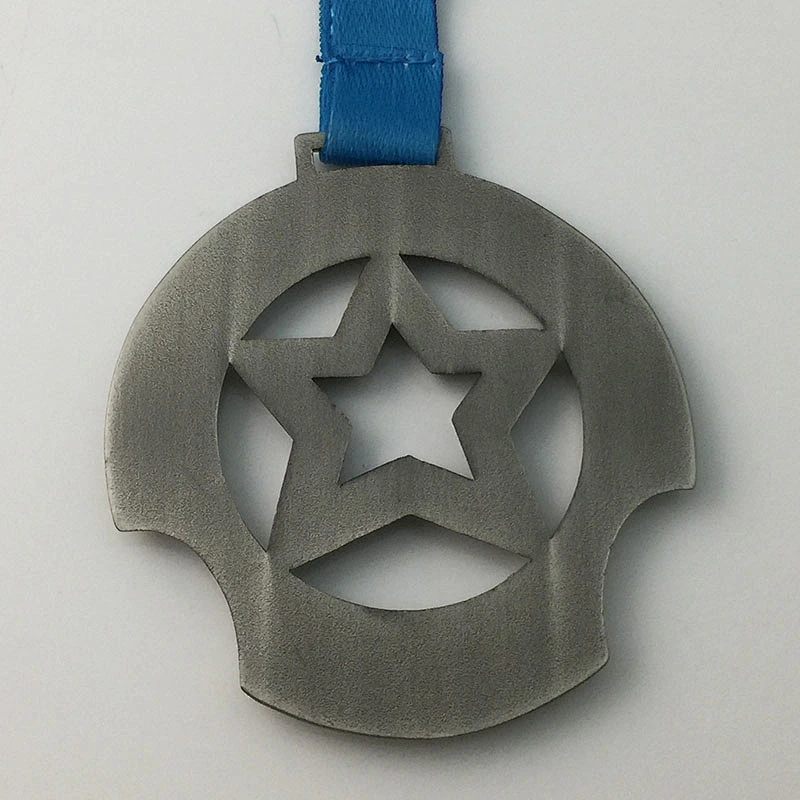 Silver star shape metal medal