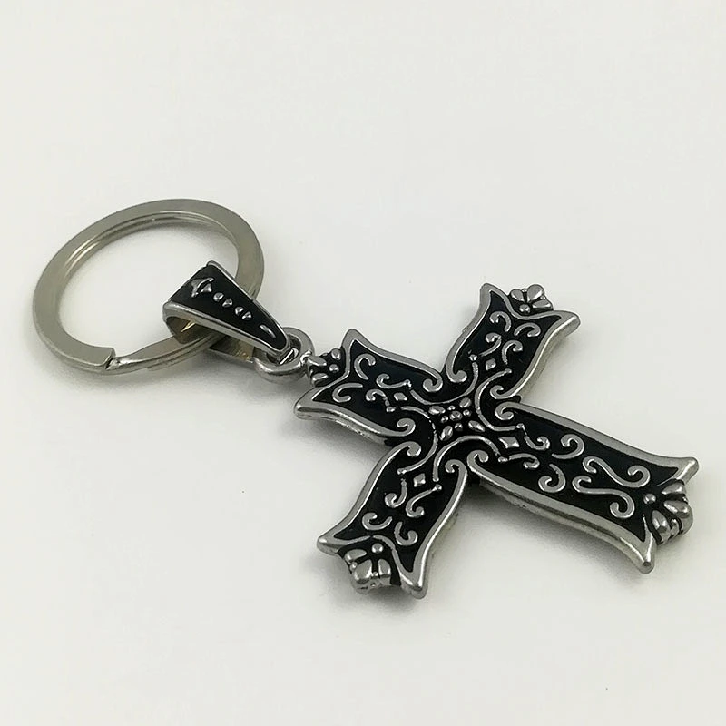 Cross shaped metal keychain