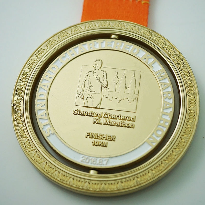 Gold rotatable finisher medal