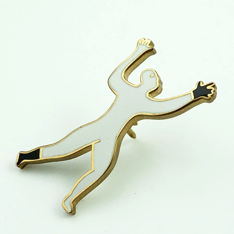 Metal man shaped pin badge